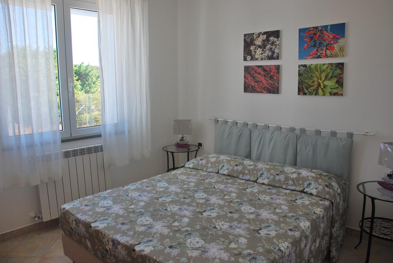 La Casa Dei Sogni Villa Portoscuso Exterior foto